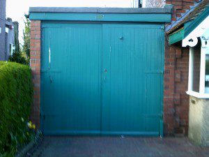 White Roller Garage Door (Before)