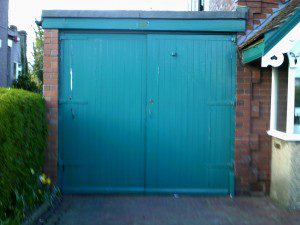 White Roller Garage Door (Before)