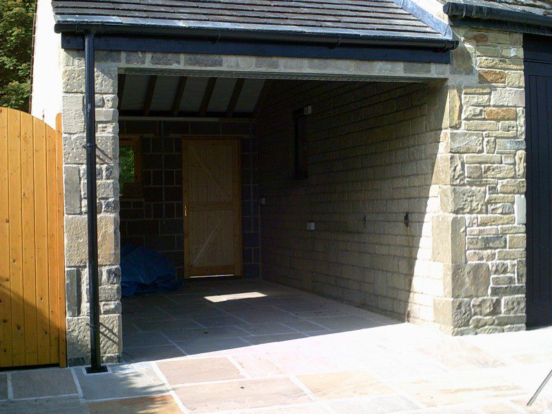 Rosewood Sectional Garage Door (Before)