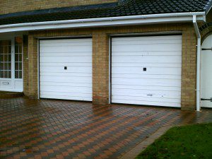 White Manual Insulated Roller Garage Doors (Before)