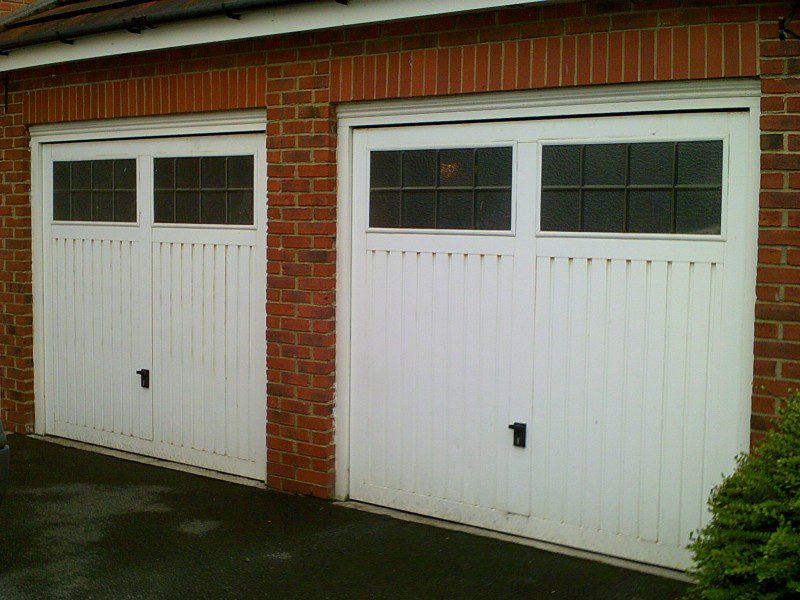 Two Insulated Sectional Garage Doors (Before)