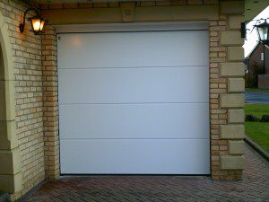 White Linear Sectional Garage Door (After)