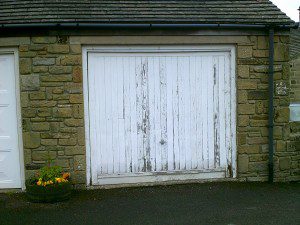 White Georgian Sectional Garage Door (Before)