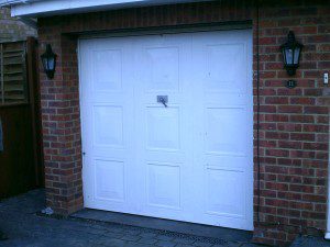 White Insulated Roller Door with Vision Lathes (Before)