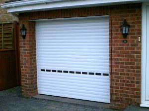 White Insulated Roller Door with Vision Lathes (After)