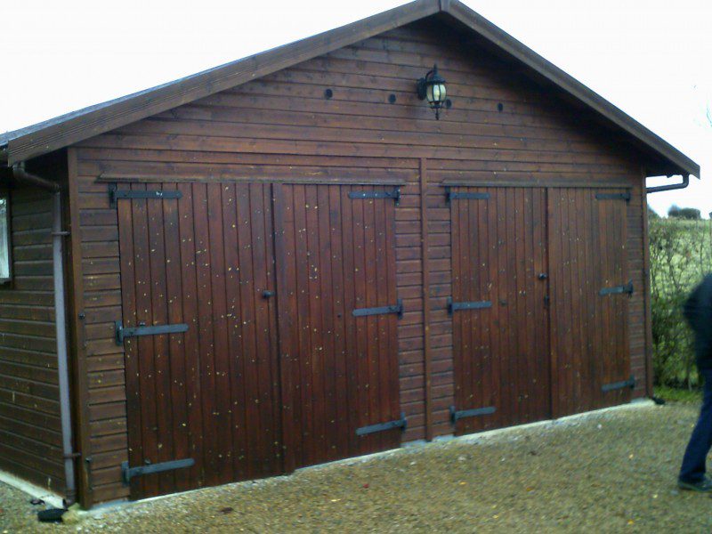 Single Skin Juniper Green Roller Doors (Before)