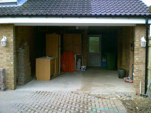 White Sectional Garage Door (Before)