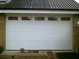 White Sectional Garage Door (After)