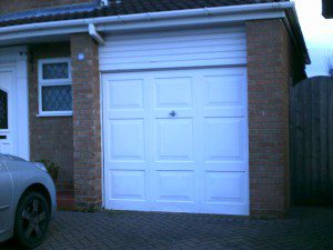 White Sectional Garage Door (Before)