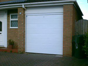 White Sectional Garage Door (After)