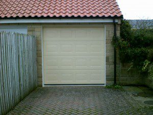 Ivory Sectional Garage Door (After)