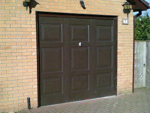 White Sectional Garage Door (Before)