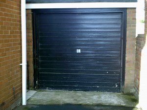 White Insulated Roller Garage Door (Before)