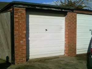 White Carlton Up and Over Garage Door (Before)