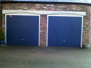 White Sectional Garage Door (Before)