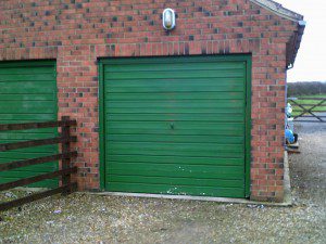 White Sectional Garage Door (Before)