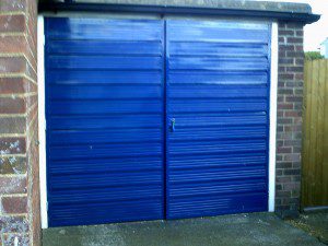 Golden Oak Sectional Garage Door  (Before)