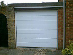 White Woodgrain Sectional Garage Door  (After)