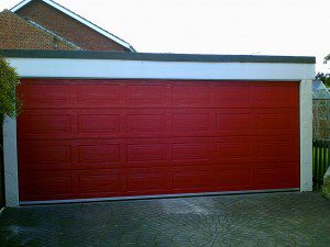 Red Woodgrain Sectional Garage Door (After)