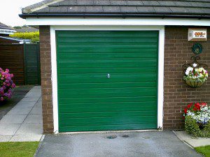 Moss Green Sectional Garage Door (Before)