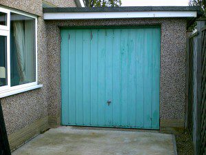 White Garador Sectional Garage Door (Before)