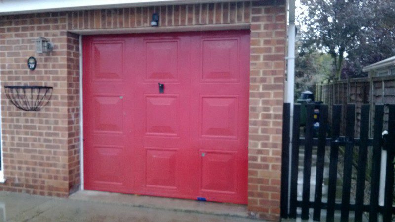 Cathedral up and over garage door (Before)