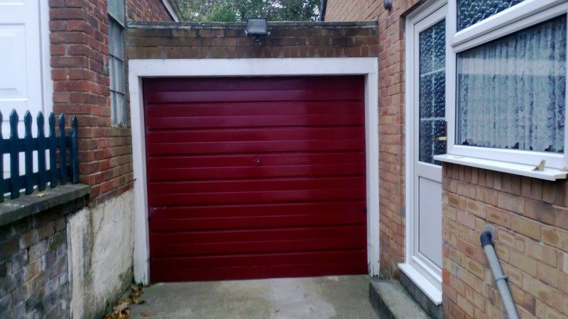 Cathedral up and over garage door (Before)