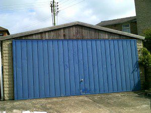 White Insulated Roller Garage Door (Before)