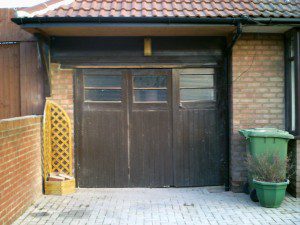 Rosewood Sectional Garage Door (Before)