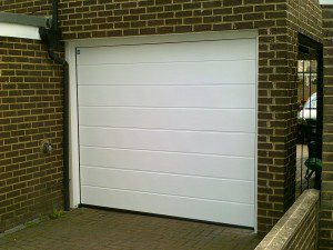 White Woodgrain Sectional Garage Door (After)