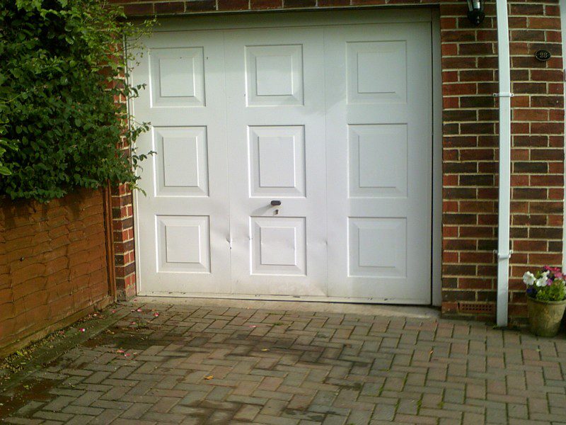 White Roller Garage Door (Before)