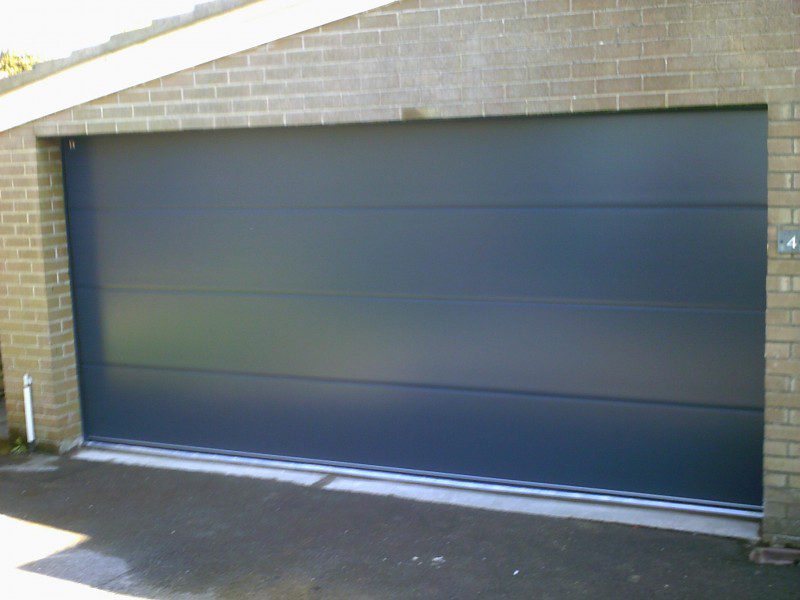 Grey Insulated Sectional Door (After)