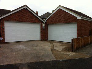 White Georgian Sectional Garage Doors (After)